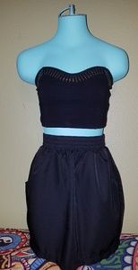 Gold and silver studded black tube top.